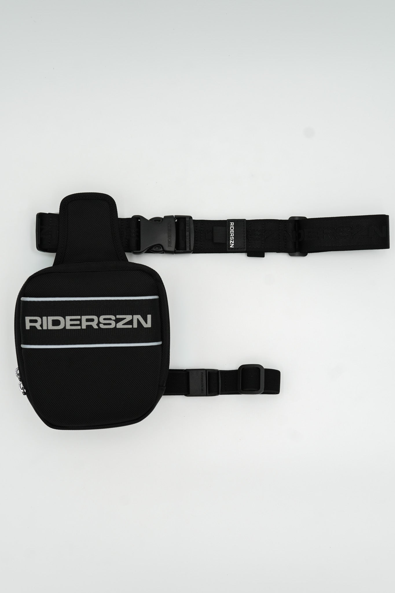 Black leg and waist bag with 'RIDERSZN' branding on a white background
