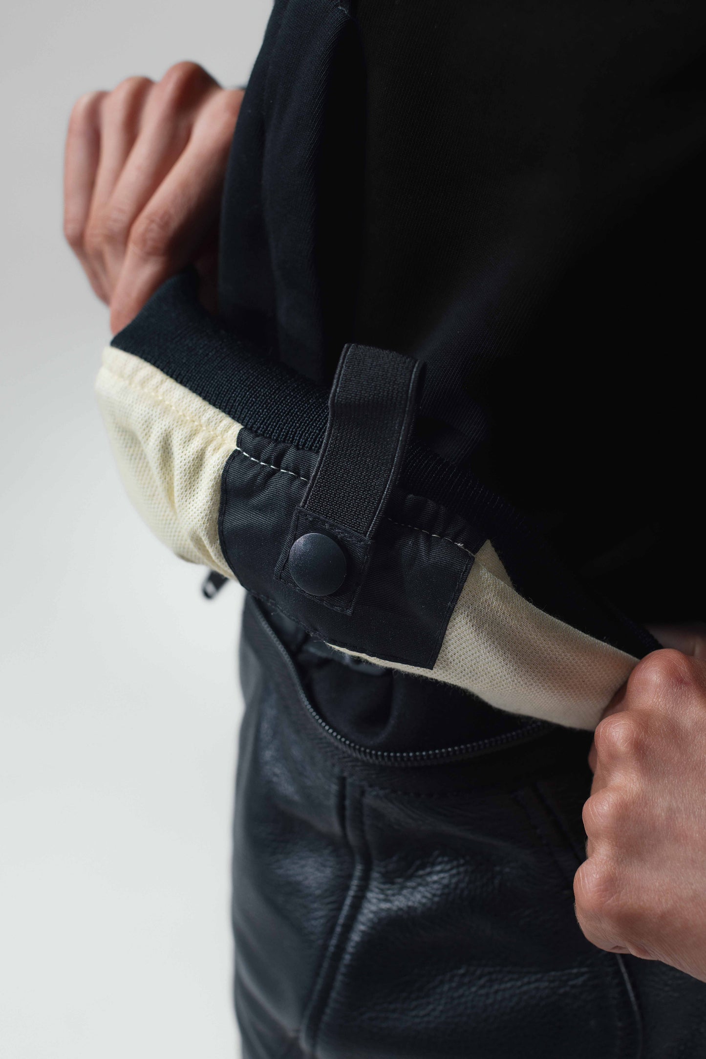 Close up of armoured hoodie belt loop clips