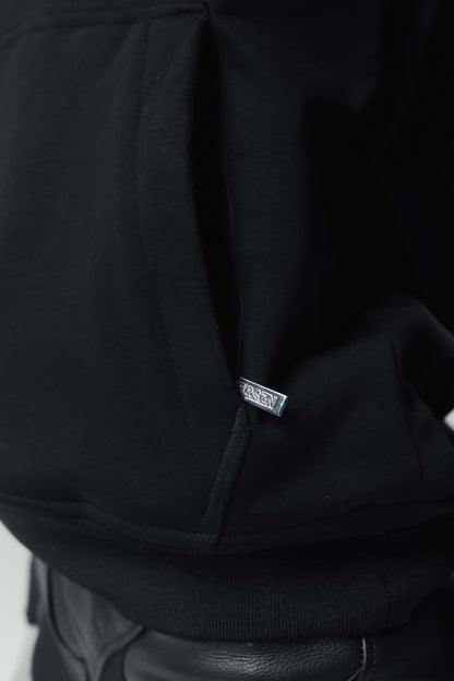 close up of armoured hoodie with metal zipper on pocket
