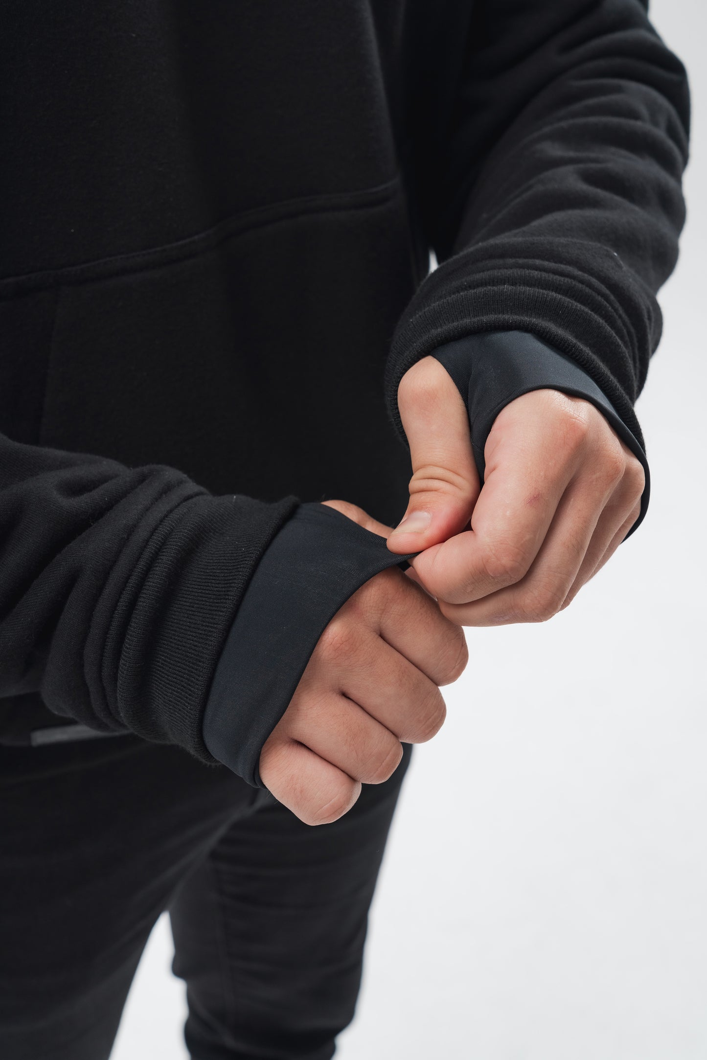 Close up of Rider SZN armoured hoodie thumb loops.